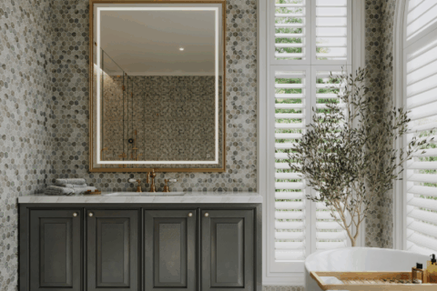 Modern bathroom design featuring advanced tile, quartz, and stone applications.