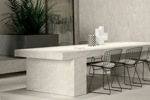 Contemporary dining table and walls made from porcelain slabs.