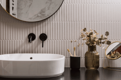 Contemporary bathroom vanity wall showcasing advanced ceramic manufacturing in interior design.